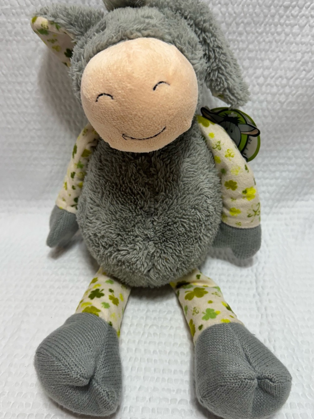 Dusty the Irish Donkey gray donkey body shamrock-printed fabric arms and legs.16